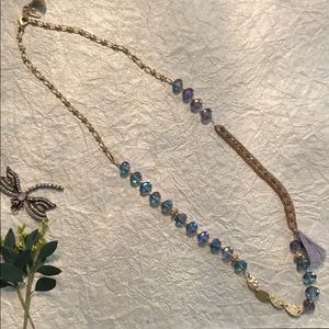 Necklace with purple, gold and bronze beads